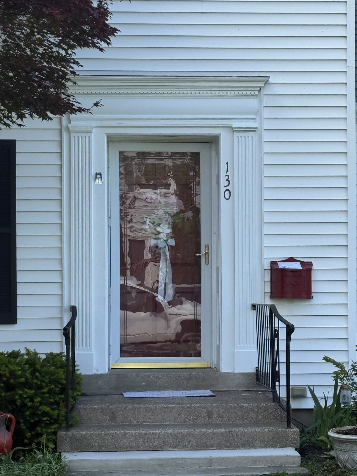 Restored entry with crisp fluted trim and fresh paint