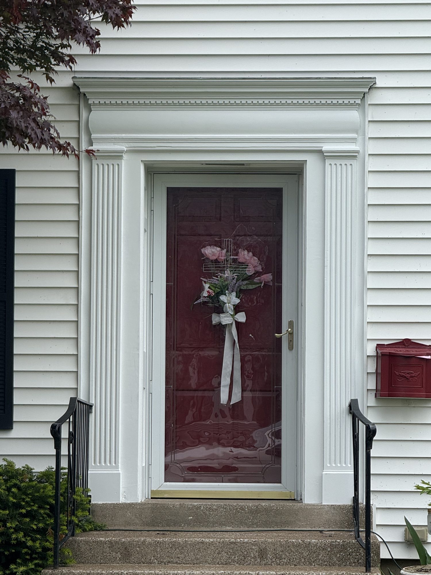 Restored entry with crisp fluted trim and fresh paint