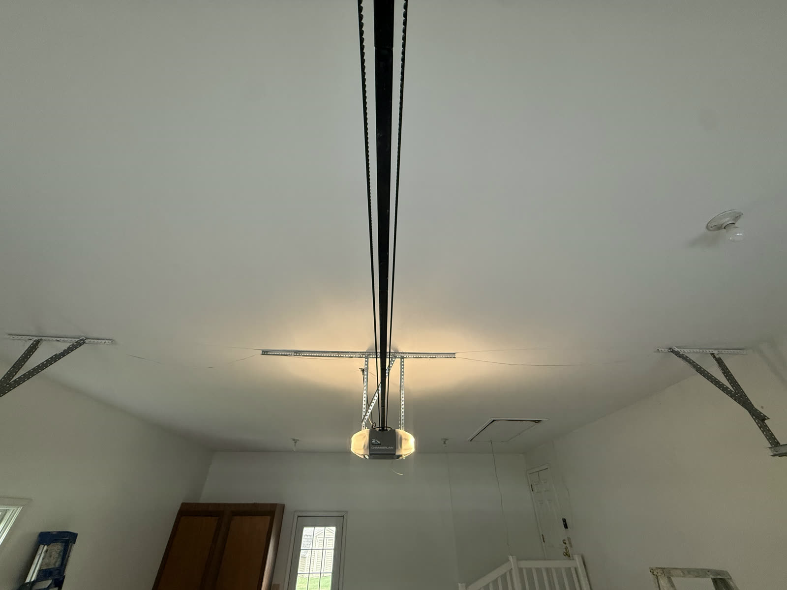 Finished garage ceiling with new drywall, taped and painted